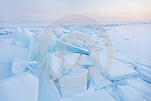 Ice-drift of Baikal lake. Turquoise ice floe. Winter landscape.