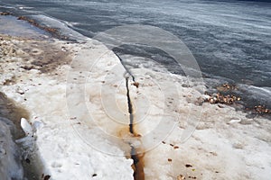 Ice drift in spring on Lake Onega, Karelia. Dangerous thin spring ice in April. Aggregate accumulations of fine