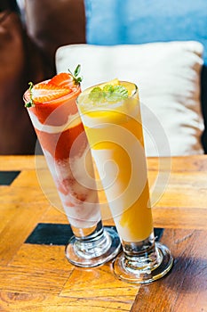 Ice drinking mango smoothie glass