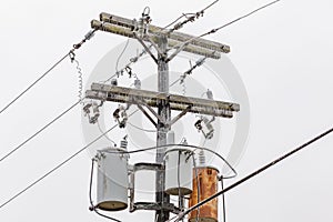 Ice on electrical utility pole and power line from freezing rain