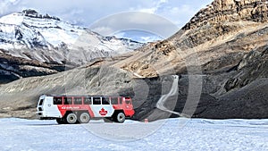 Ice Explorer, an all terrain vehicle with monster tires, on the Athabasca Glacier getting ready to depart the ice field.