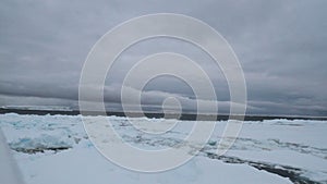 Ice field and iceberg, Antarctica