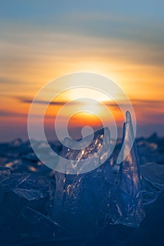 Ice figurines on sky background during sunset