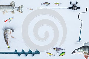 Ice fishing concept. Frame template with fish and tackles on snow photo