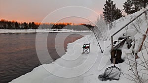 ice fishing North of Sweden in the spring