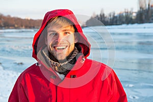 Ice fishing is winter tradition. Man warm jacket clear solid ice background. Exploration of polar regions. Winter