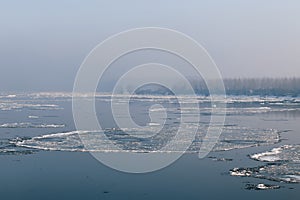 Ice floating in the river. Ice Break up