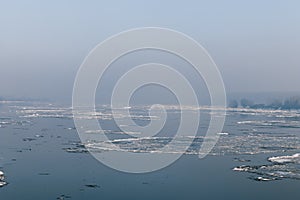 Ice floating in the river. Ice Break up