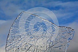 Ice floe with Grass strukture and blue sky