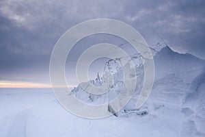 Ice floe and snowstorm.