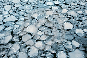 Ice floes background of winter river.