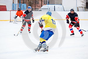 Ice hockey game on rink