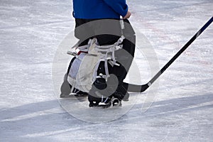 Ice Hockey Goalie shot slapshot start stick . photo