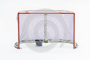 Ice hockey net with puck