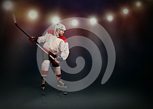 Ice Hockey player ready to make a snapshot