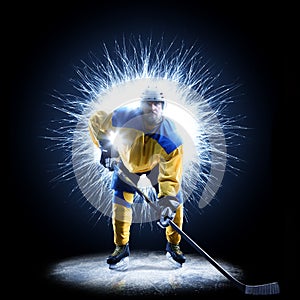 Ice Hockey player is skating on a abstract background