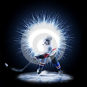 Ice Hockey player is skating on a abstract background photo