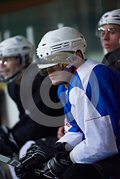 Ice hockey players on bench