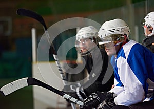 Ice hockey players on bench