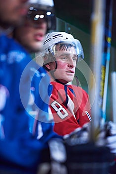 Ice hockey players on bench