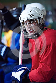 Ice hockey players on bench