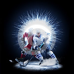 Ice Hockey players are skating on a abstract background photo