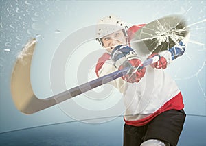 Ice hockey puck hit the opponent visor photo