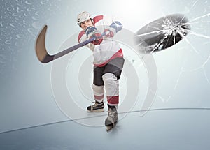 Ice hockey puck hit the opponent visor photo