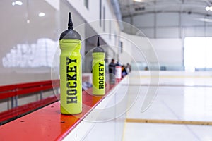 Ice hockey rink, bottle on board
