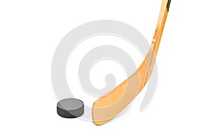 Ice hockey stick and puck