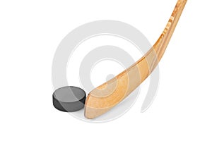 Ice hockey stick and puck