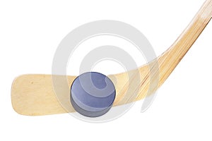 Ice hockey stick and puck isolated on white