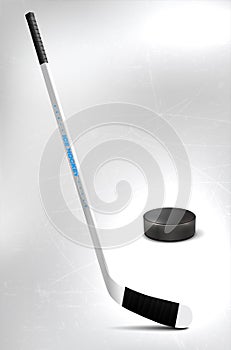 Ice hockey stick and puck on scratchy ice