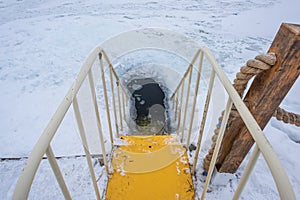 Ice-hole with metal ladder