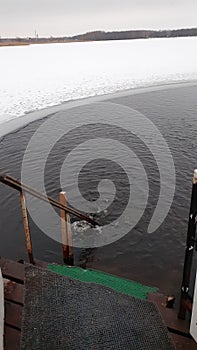 Ice hole. Swimming in ice water. Epiphany.