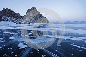 Ice on Lake Baikal. Shamanka rock. Evening landscape