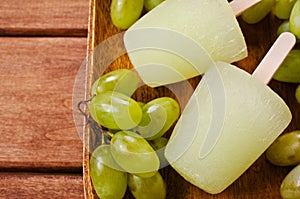 Ice lolly of green grapes