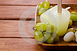 Ice lolly of green grapes