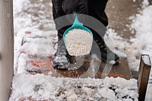 Ice melt rock salt is being spread on your walking path to melt the snow and ice