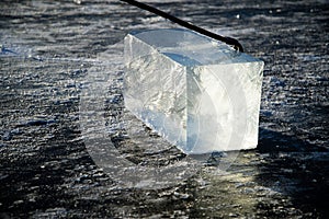 `Ice Miners` workers mine large cubes of natural river ice