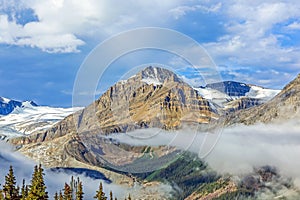 Ice on mountain top with clouds