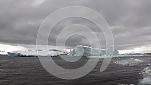 Ice movement icebergs of global warming floats in ocean of Antarctica.