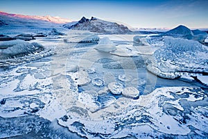 Ice patterns abound in Jokulsaralon Glacier Lagoon in Iceland photo