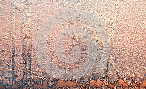 Ice patterns on winter glass. Frost Background