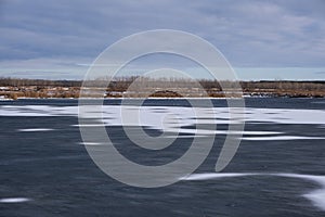 Ice on river in early spring. Early spring in Siberia