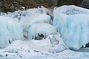 Ice on rock in Baikal lake winter season Russia