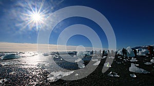 Ice rocks on a black sand beach