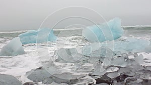 Ice rocks on a black sand beach in Iceland