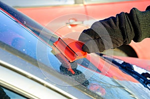 Ice scraping - removing ice and snow from car