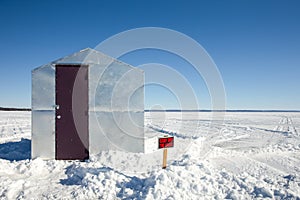 Ice Shanty with Funny Sign